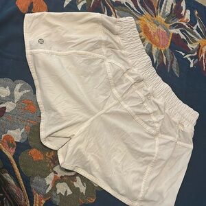 Lululemon white running shorts. Size 10. Never worn.